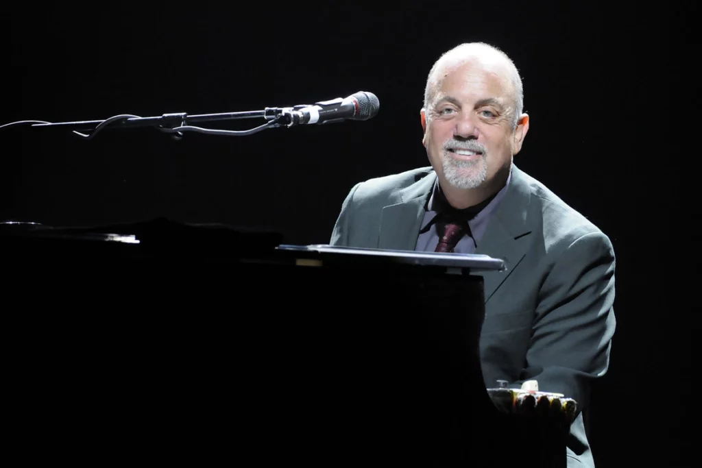 Billy Joel preforming on stage before 2025 concert cancellations