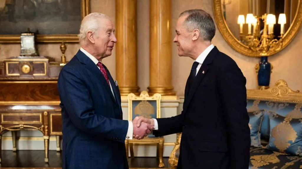 King Charles III shaking hands with Prime Minister Mark Carney