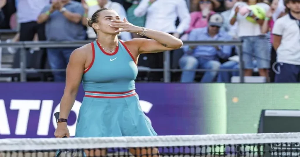 Aryna Sabalenka celebrating after saving match points.