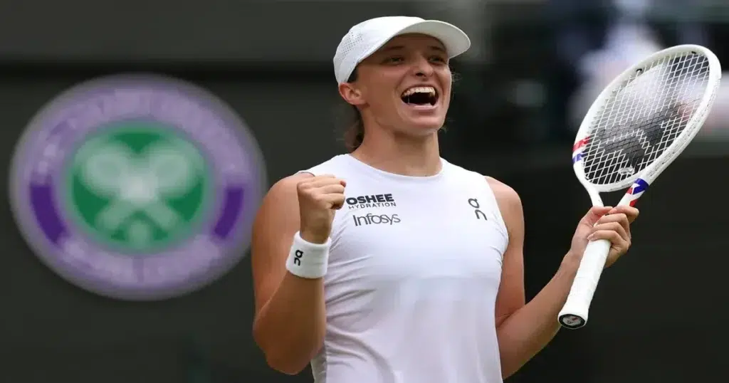 Iga Swiatek celebrates victory at Wimbledon 2025 semifinal.